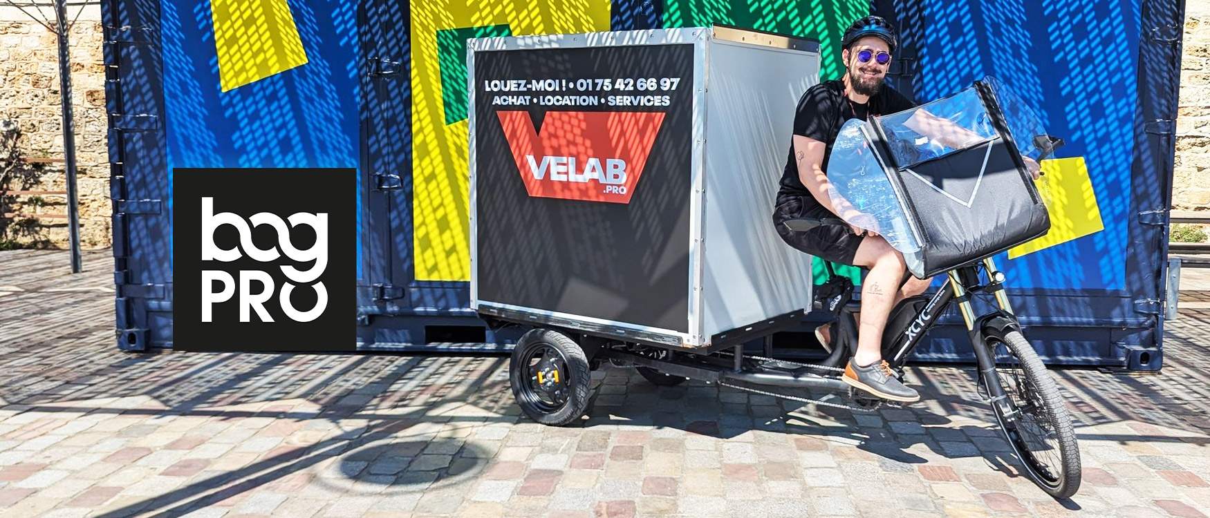 banniere montrant un homme sur un vélo cargo équipé du caisson S.C.B. de Bag PRO